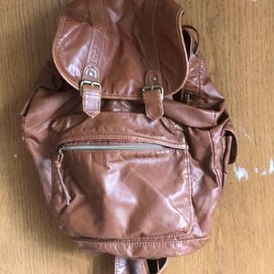 brown strap bag